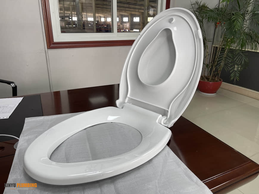 Elongated baby toilet seat 11