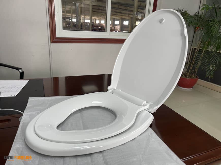 Elongated baby toilet seat 12